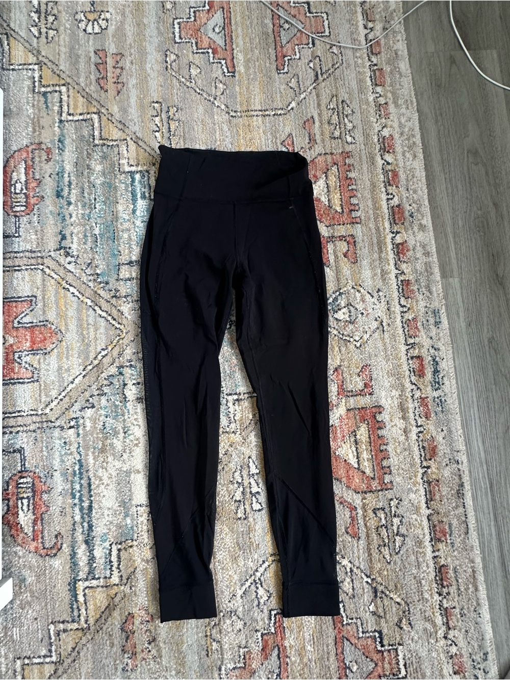 Lululemon Women’s Black Athletic Leggings with mesh side panels
